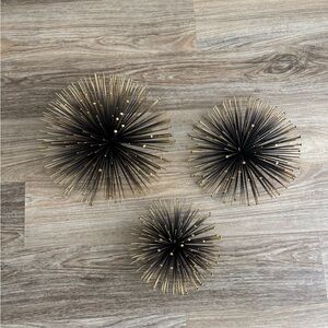 Cost Plus World Market Gold and Black Starburst Sculptures